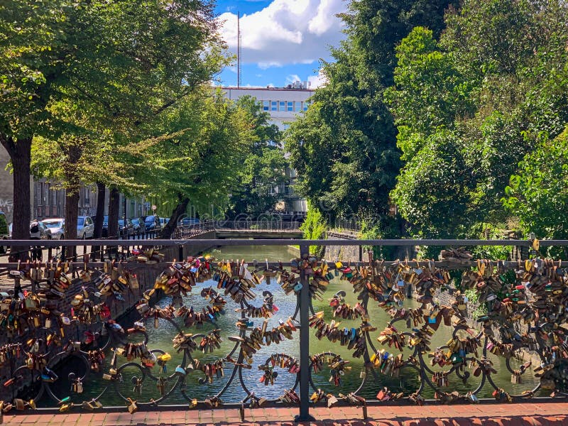 Many Padlocks Hang on the Bridge of Love at Kolberg in Poland Stock