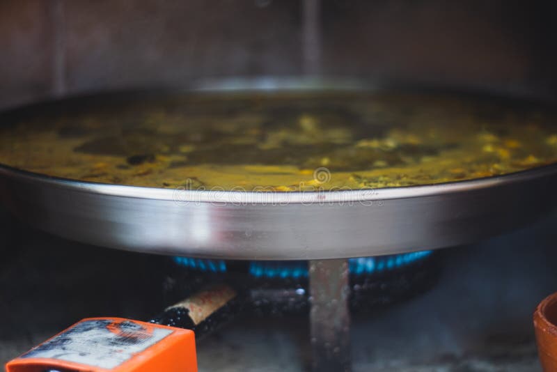 Paella Cooked with a Gas Stove Stock Photo Image of cooking, dinner