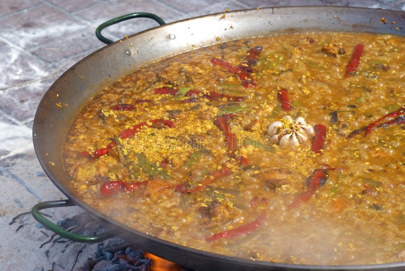 Cooking paella stock image. Image of vertical, chicken 24629679