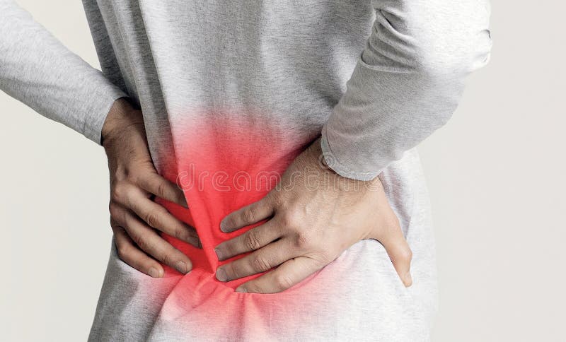 Pain in back and kidneys of man stock photo