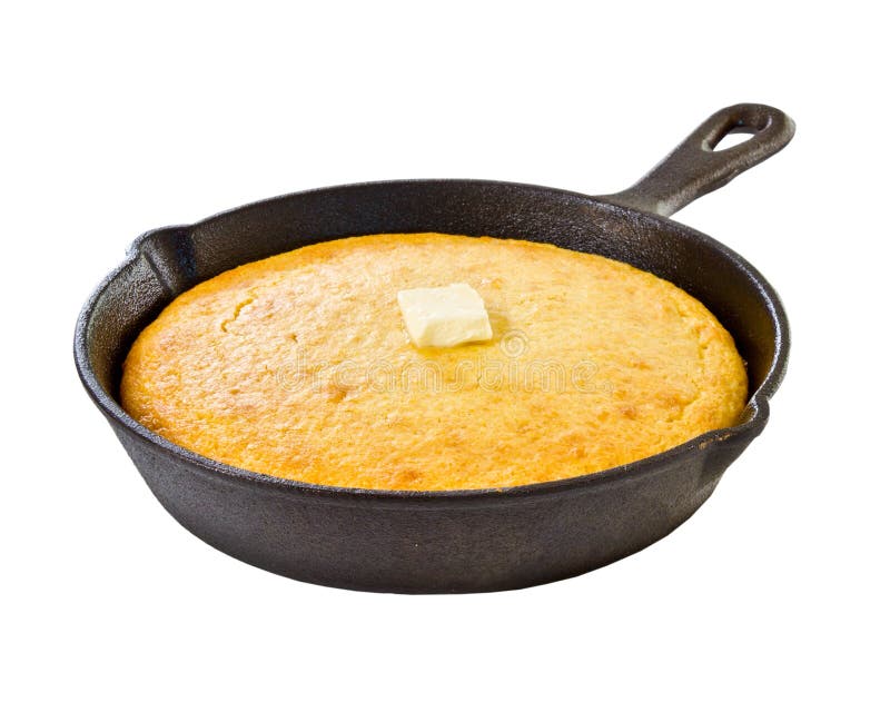 Pain de maïs dans le skillet de fer images stock Pain de maïs dans le skillet de fer images stock