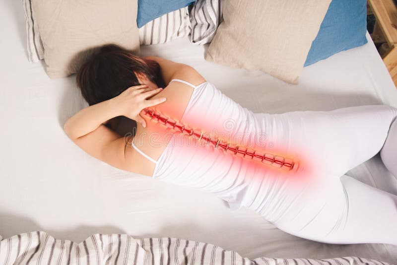 Pain in the spine, woman with backache at home, back injury, photo with highlighted skeleton