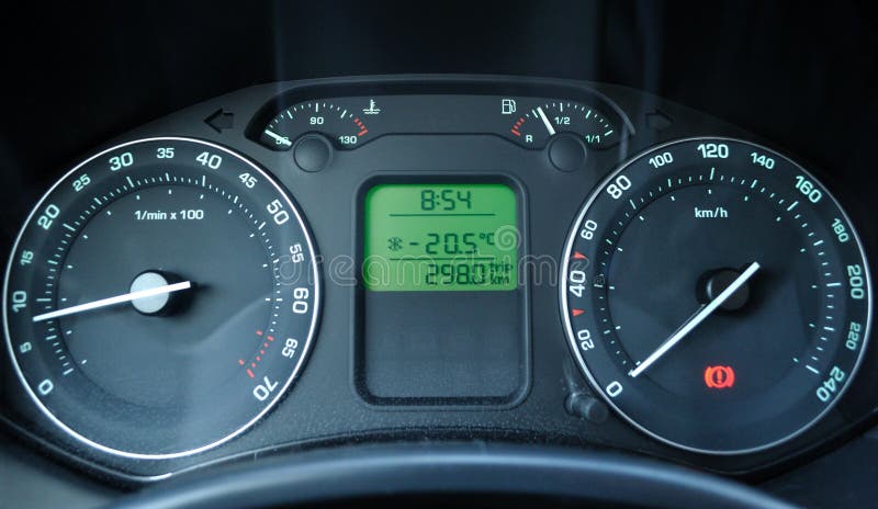 This photograph represent a dashboard of a car with frozen snow particles. The thermometer shows -20 C (-68 F). This photograph represent a dashboard of a car with frozen snow particles. The thermometer shows -20 C (-68 F).