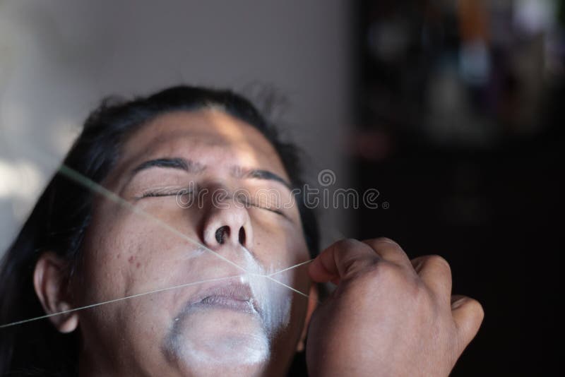 Painful Plucking and Removal of Upper Lip Hairs of a Lady with Threading.  Epilation Cosmetic Procedure in Beauty Parlour Stock Photo - Image of  eyelashes, paint: 135680954