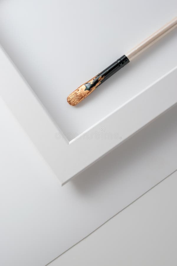 Paint Brush with Golden Paint on, Minimalist Design. DIY, Handcraft and