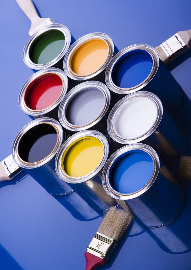 Paintbrushes Dripping into Paint Containers Stock Image Image of