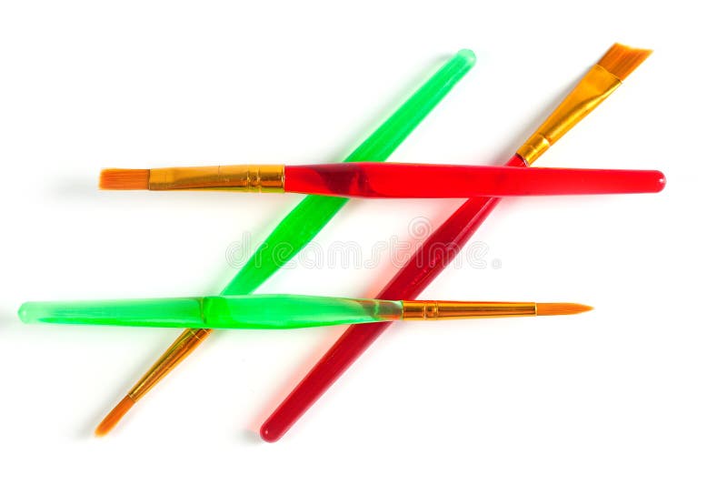 Paint Brushes of Various Shapes and Widths with Bright Plastic Handles Stock Image Image of