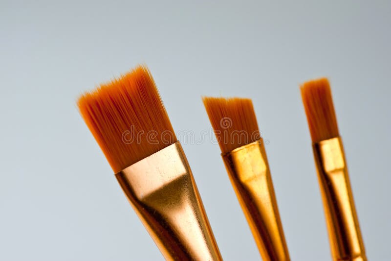 Paint Brushes of Various Shapes and Widths with Bright Plastic Handles Stock Photo Image of
