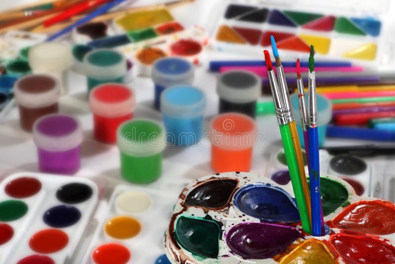 Paint palettes and brushes stock image. Image of gouache 73409837