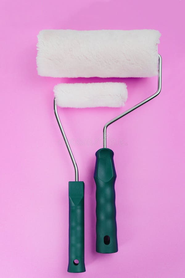 Paint Rollers and Brushes in a Special Bath or Ditch Stock Photo