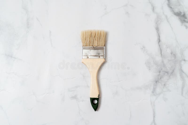 Paint Tool Brush Top View on Marble Background. Minimal Concept of