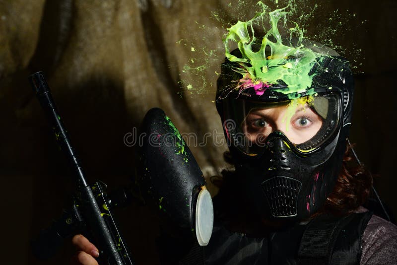 Paintball Game Splash after Direct Hit in the Protecting Mask Stock