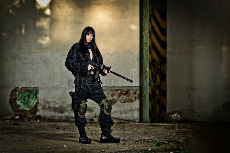 Paintball marker and girl stock photo. Image of commando 23035084