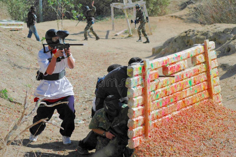 Paintball Players Behind Bunker Stock Photo Image of guns, break 458264
