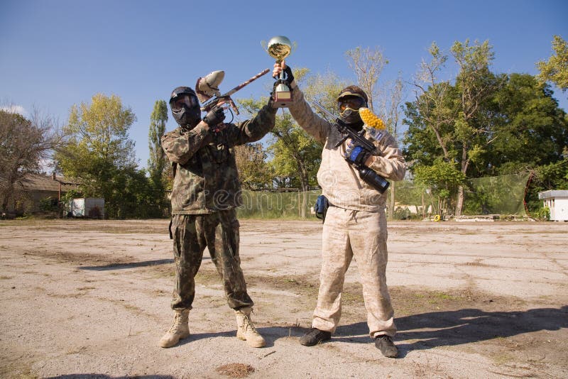 Paintball Players with Gold Cup Stock Image Image of people, person 7550965