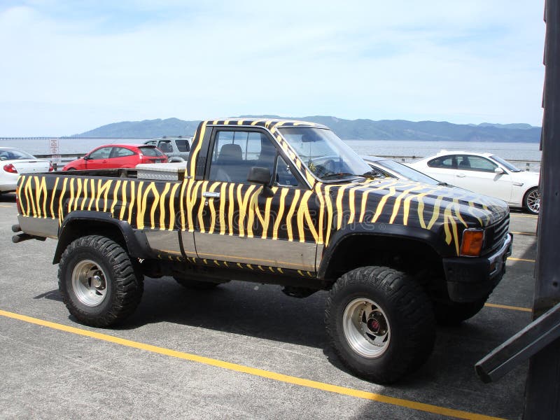 Painted car editorial image. Image of street, parked 79891360