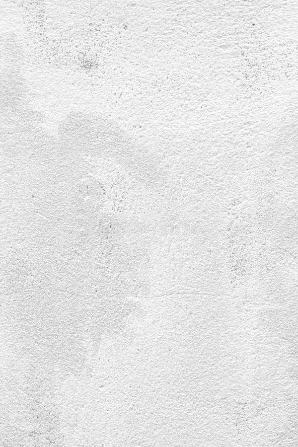 Painted Concrete Wall in White with Vertical Crack Lines and Rough