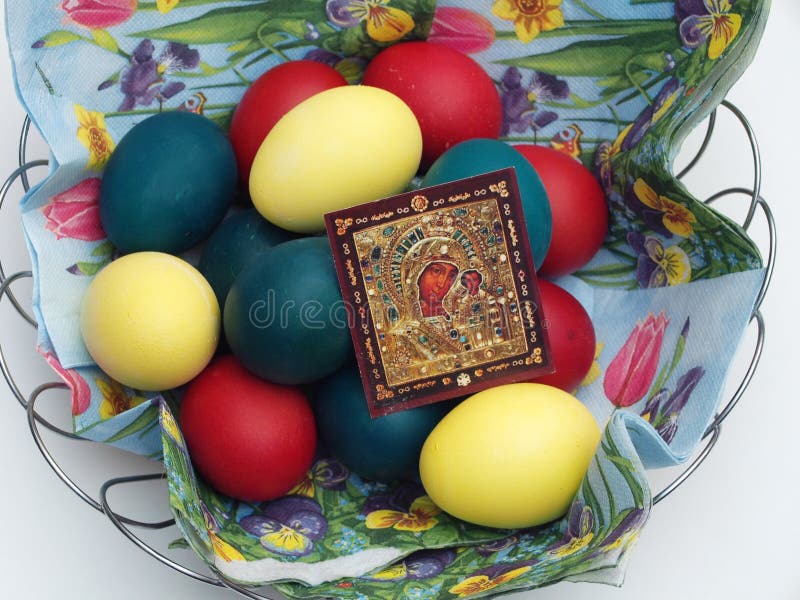 Painted Easter Eggs in a Basket with an Icon. Orthodox Easter Tr Stock