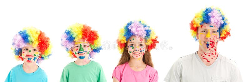 Painted faces clown wigs on family of dad and kids stock photo Painted faces clown wigs on family of dad and kids stock photo