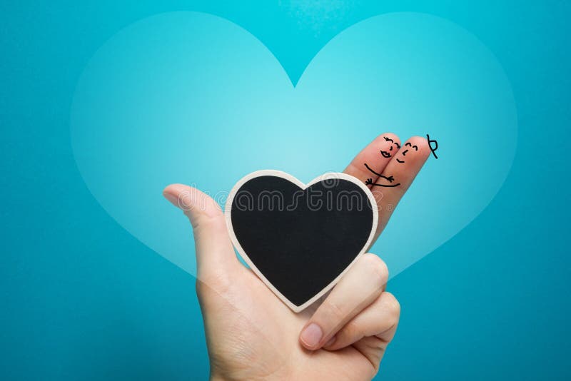 Painted happy fingers smiley in love with blackboard heart stock illustration Painted happy fingers smiley in love with blackboard heart stock illustration