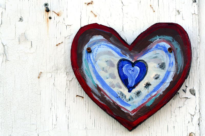 Peeling paint on a white wall with a colorful painted heart. Painted curve stock images, royalty-free photos and pictures