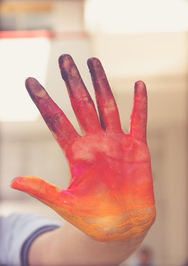 Painted human hand photograph stock photo