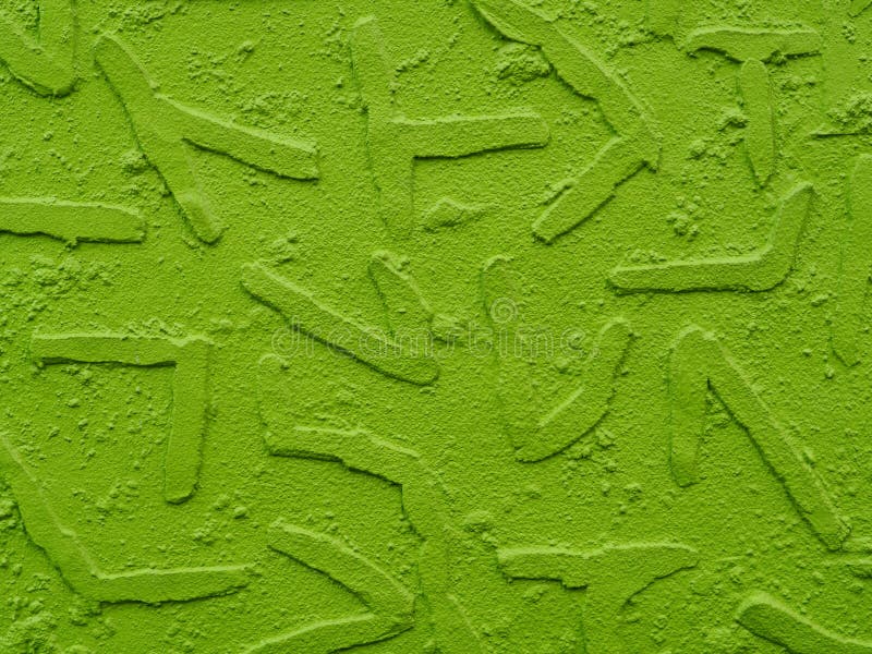 Painted plaster wall background with geometric shapes extruding , neon green.