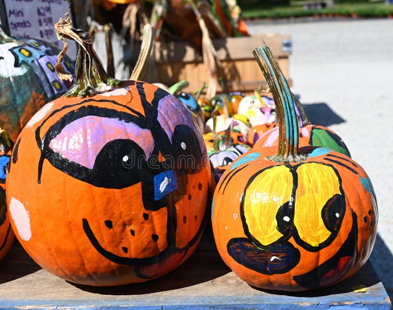 Painted Pumpkin Faces stock photo. Image of comical - 198384278