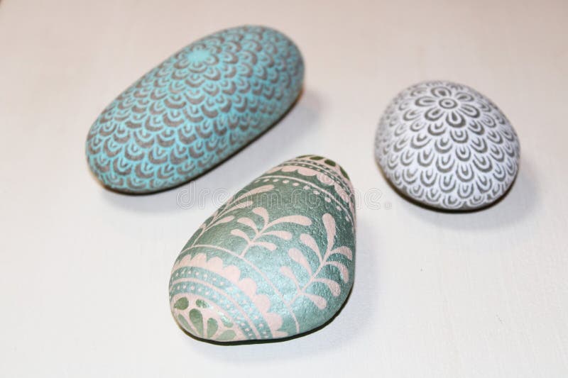 Painted stones, stone art, painting stones stock photo