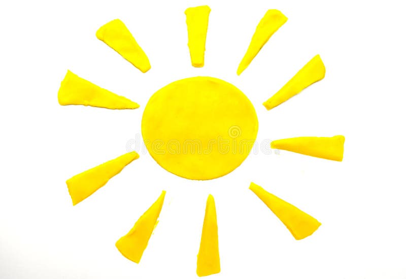 Painted yellow sun of plasticine on background