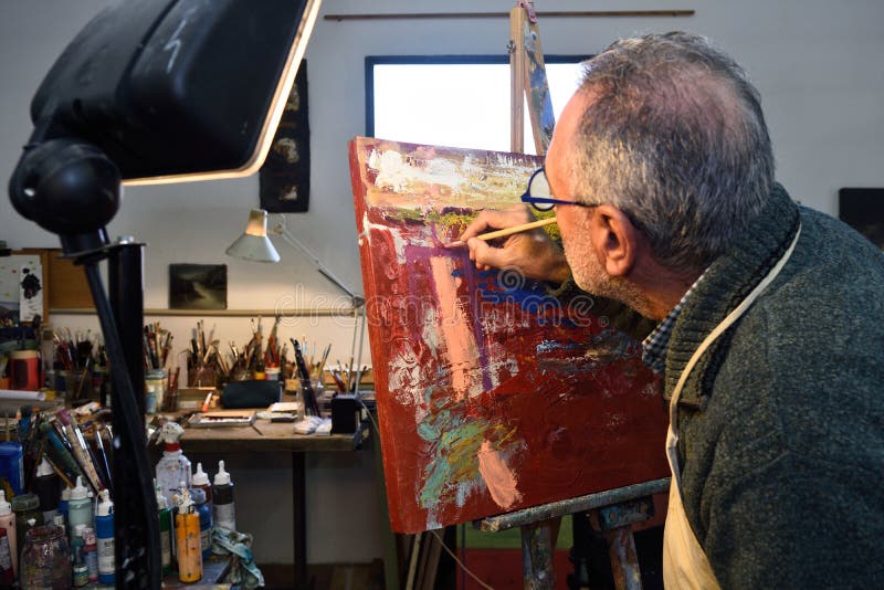 Painter Artist Painting a Picture in the Studio Stock Image Image of