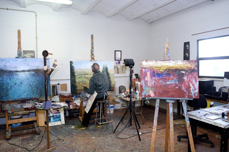 Painter Artist Painting a Picture in the Studio Stock Photo - Image of