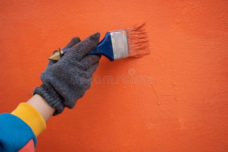 Painter Labor Paint the Wall Using Paint Plots and Rollers. Concepts of