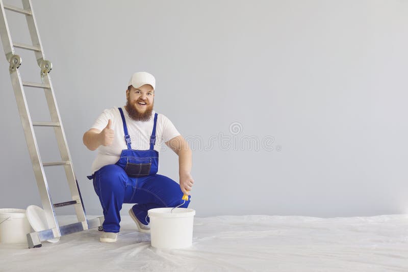 Painter Painting. Funny Male Painter with a Roller Skater Standing Paints in the Background. Stock Photo - Image of room, employee: 189363320 Painter Painting. Funny Male Painter with a Roller Skater Standing Paints in the Background. Stock Photo - Image of room, employee: 189363320