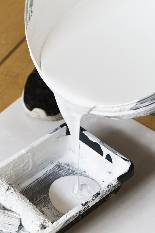 Painter Pouring Paint into Tray Stock Image Image of chocolate