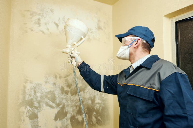 Painter Spraying Paint on Wall Indoors Stock Image Image of renewal
