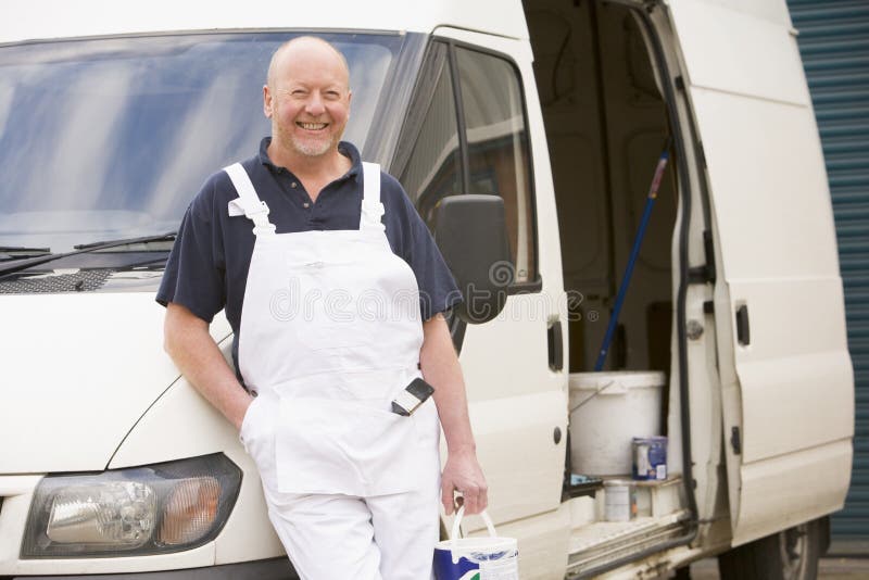 Painter standing with van royalty free stock images