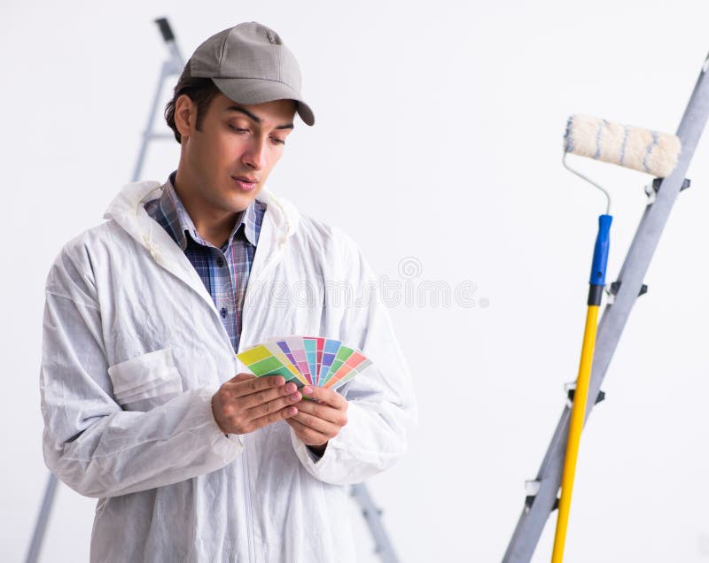 Painter Working at Construction Site Stock Photo - Image of ladder