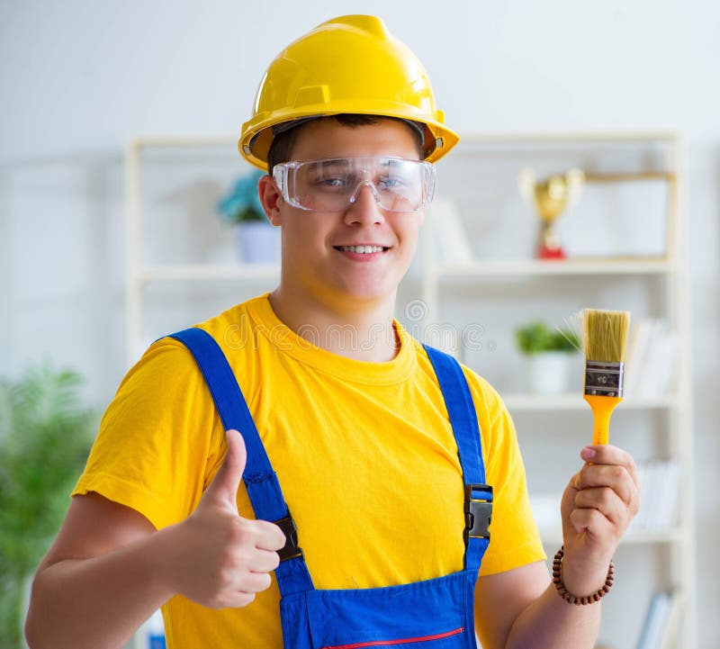 Painter Working at Home in Refurbishment Project Stock Image Image of