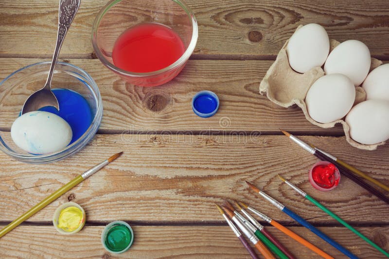 Painting eggs for Easter holiday celebration stock images Painting eggs for Easter holiday celebration stock images