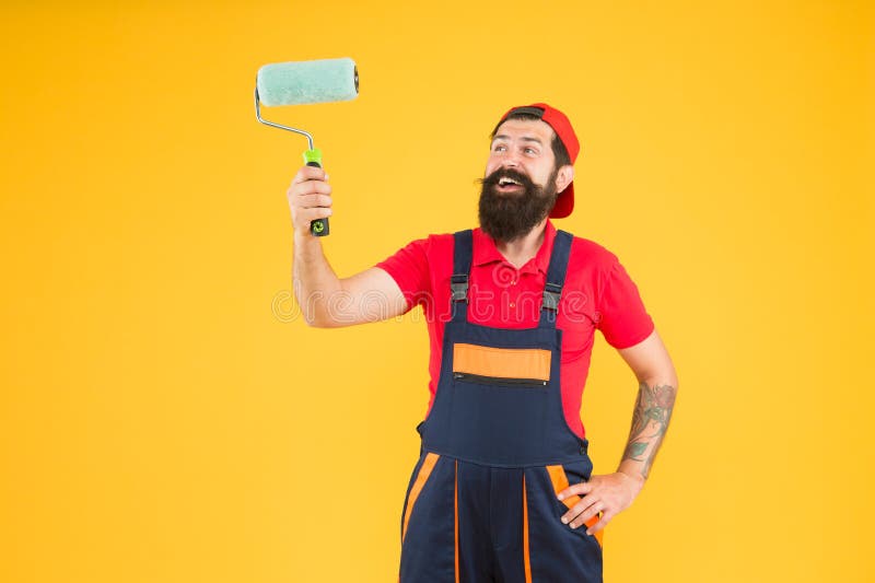 Painting Tool. Brush Roller Painter. Decoration and Decor. Man Bearded