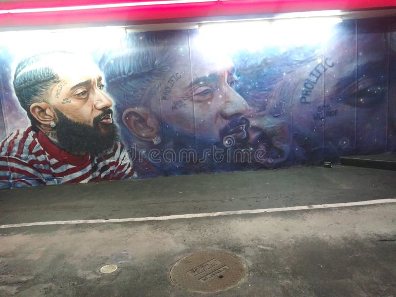 A painting on a wall in Los Angeles of Nipsey Hustle near where the shooting took place