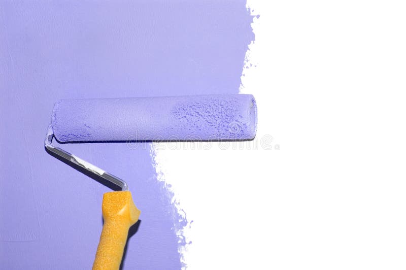 Painting a wall with a roll isolated royalty free stock image