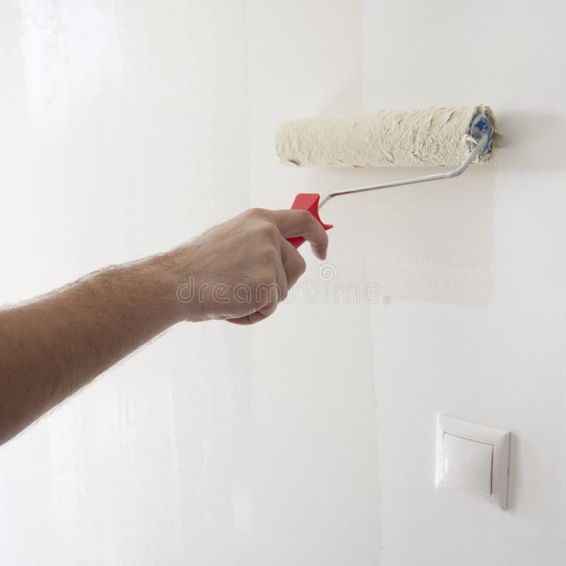 Painting the walls stock image. Image of wall, home, decorate 20595665