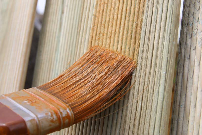 Painting wooden fence