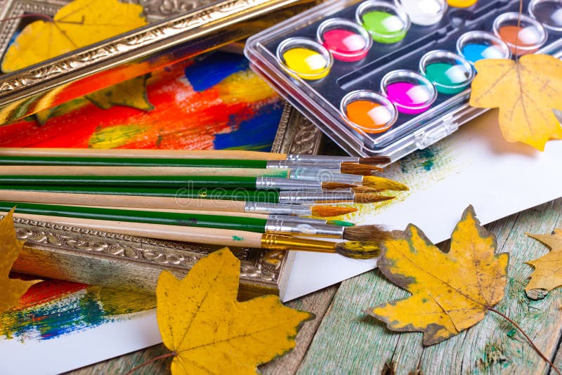 Paints and brushes stock images