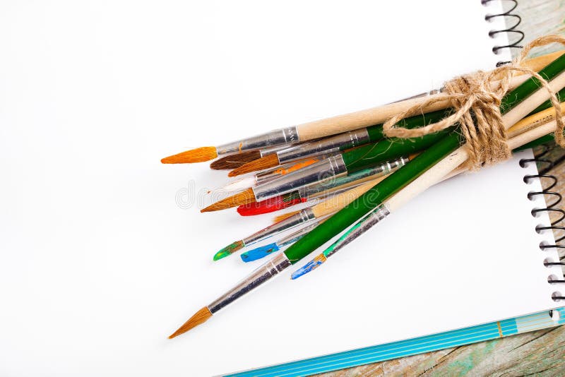 Paints and brushes royalty free stock photo