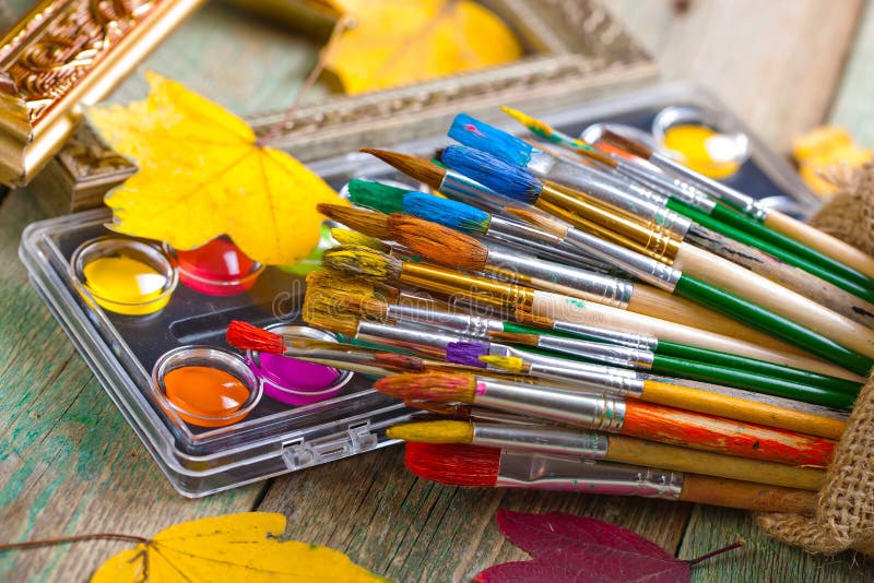 Paints and brushes royalty free stock image