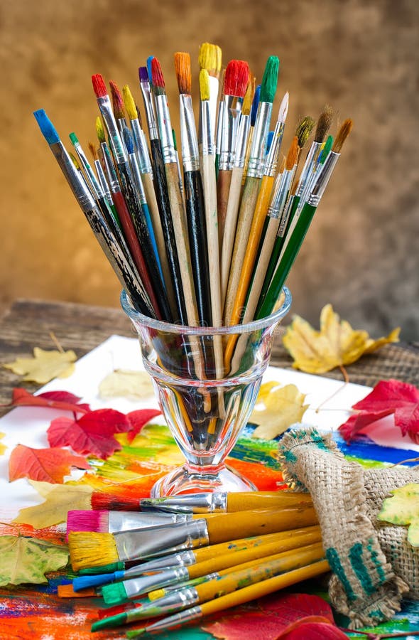 Paints and brushes royalty free stock photo