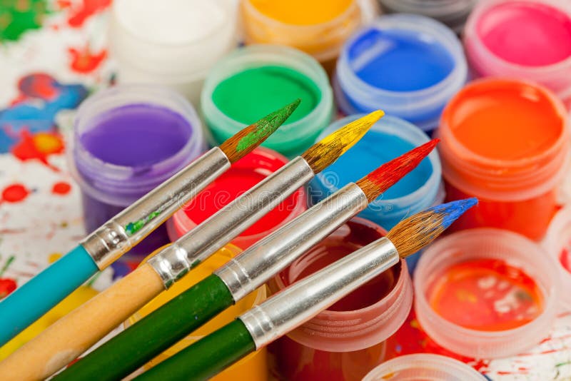 Paints and brushes stock photos